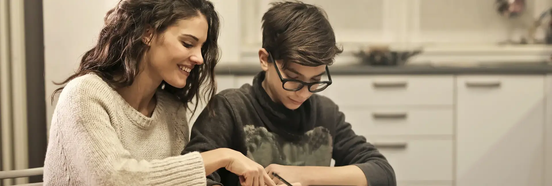 Elder Sister And Brother Studying At Home