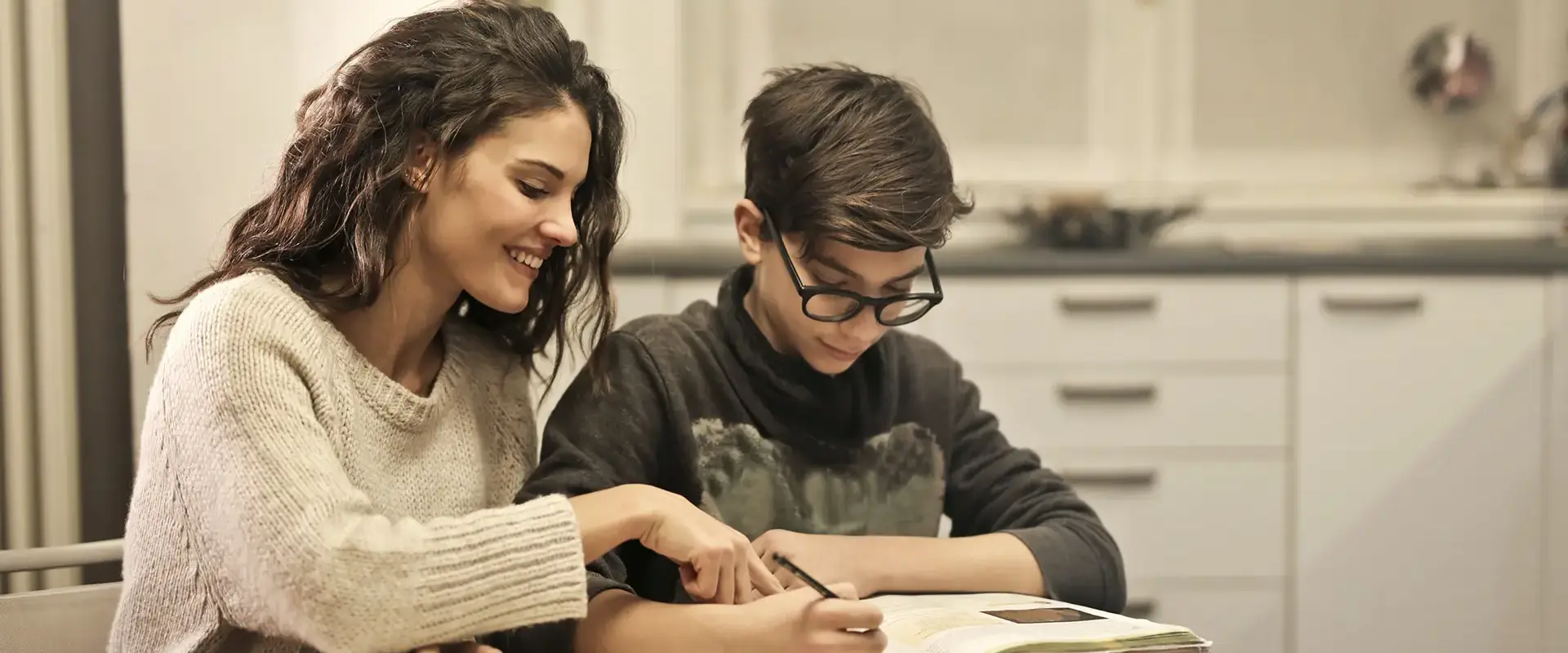 Elder Sister And Brother Studying At Home